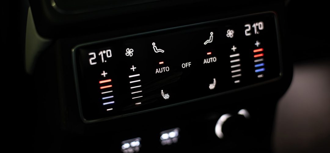Control panel rear climate control. A modern control screen in a premium car.